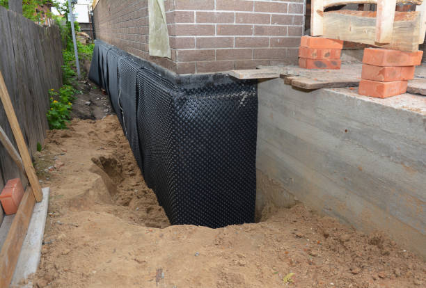 SJ Waterproofing Pros technician performing targeted Interior Drainage System assessment in Fort Mill, SC